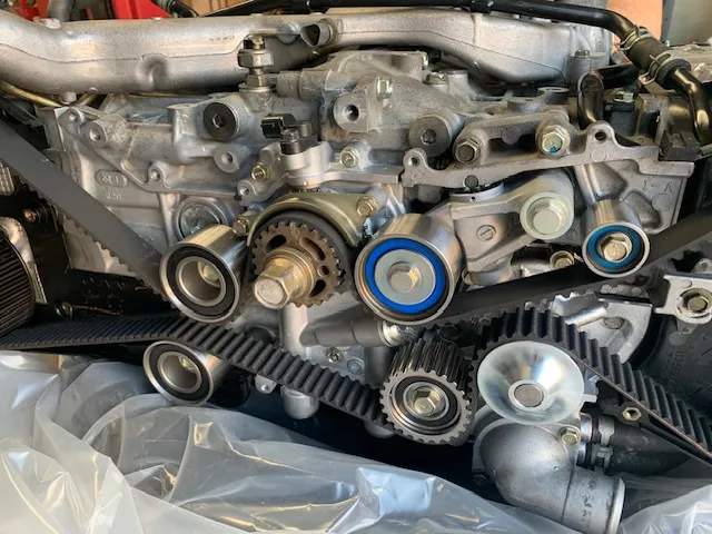 A close up of the engine of a car.
